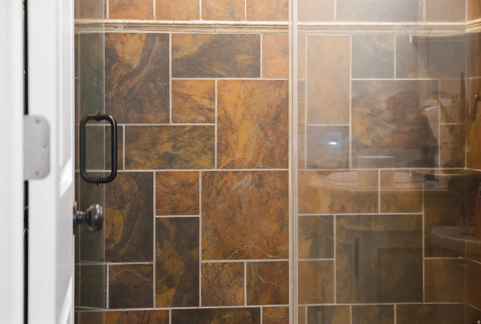 Bathroom view of a shower stall