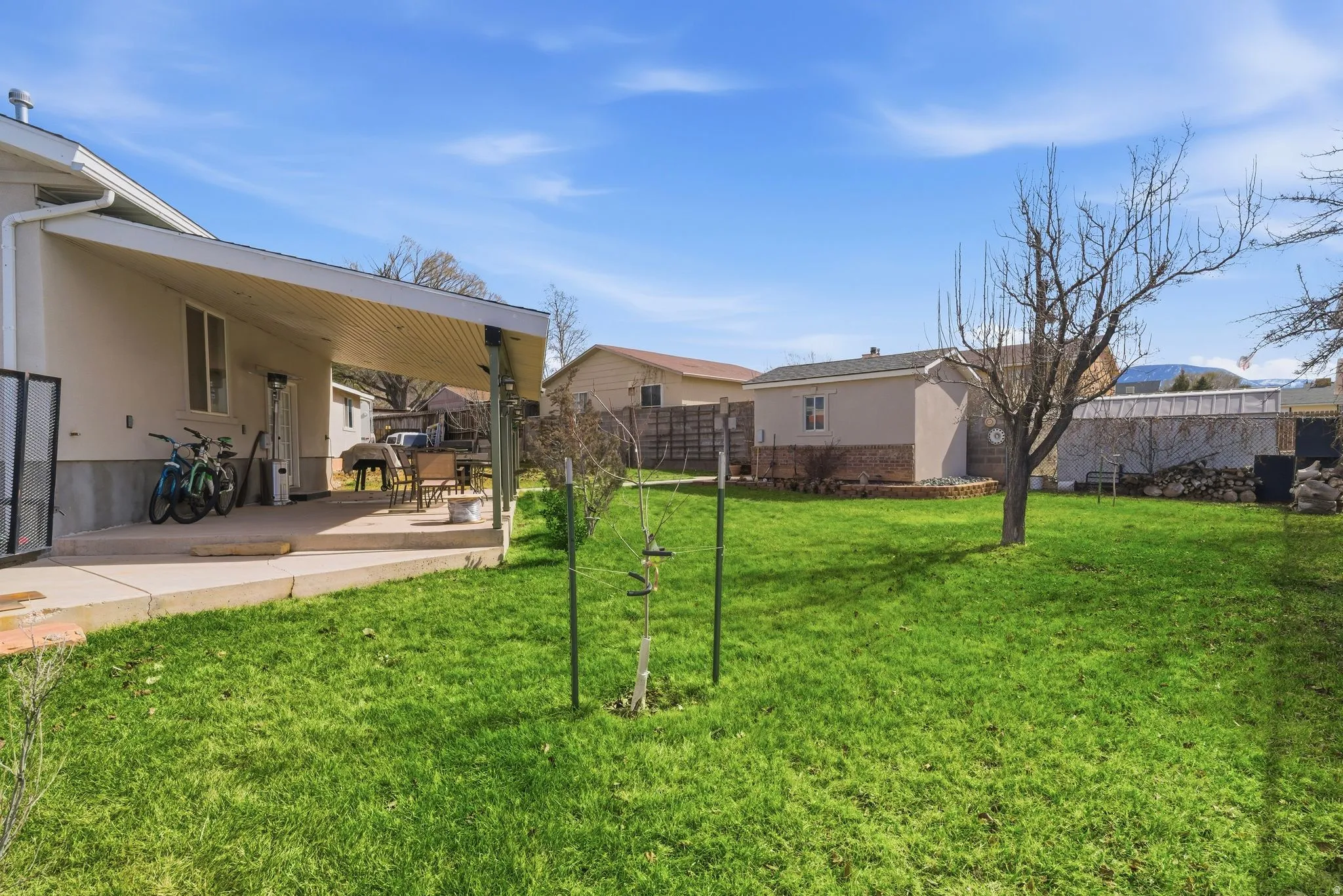 Fenced yard with a patio