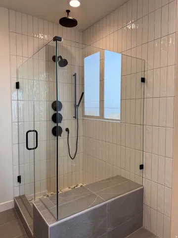 Full bathroom with a shower stall