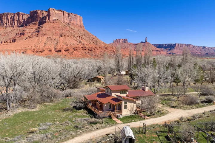West side of home with view of Parriott mesa and Castleton Tower.