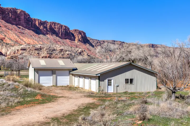6 car garage with rv parking and shop space
