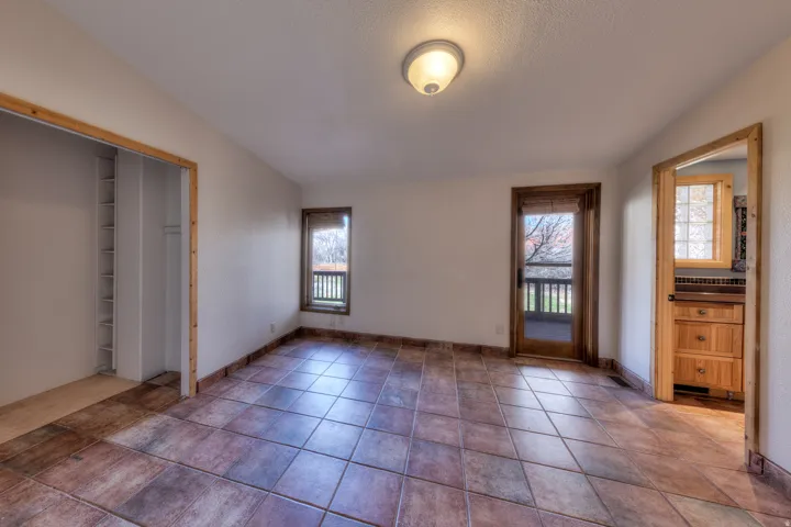 Master bedroom with private deck access