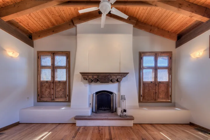 Hand carved mantle and window trim