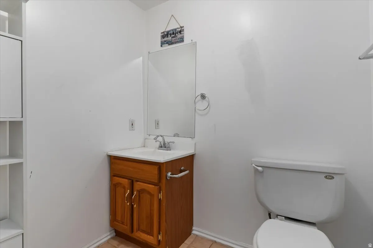 Bathroom with vanity and toilet