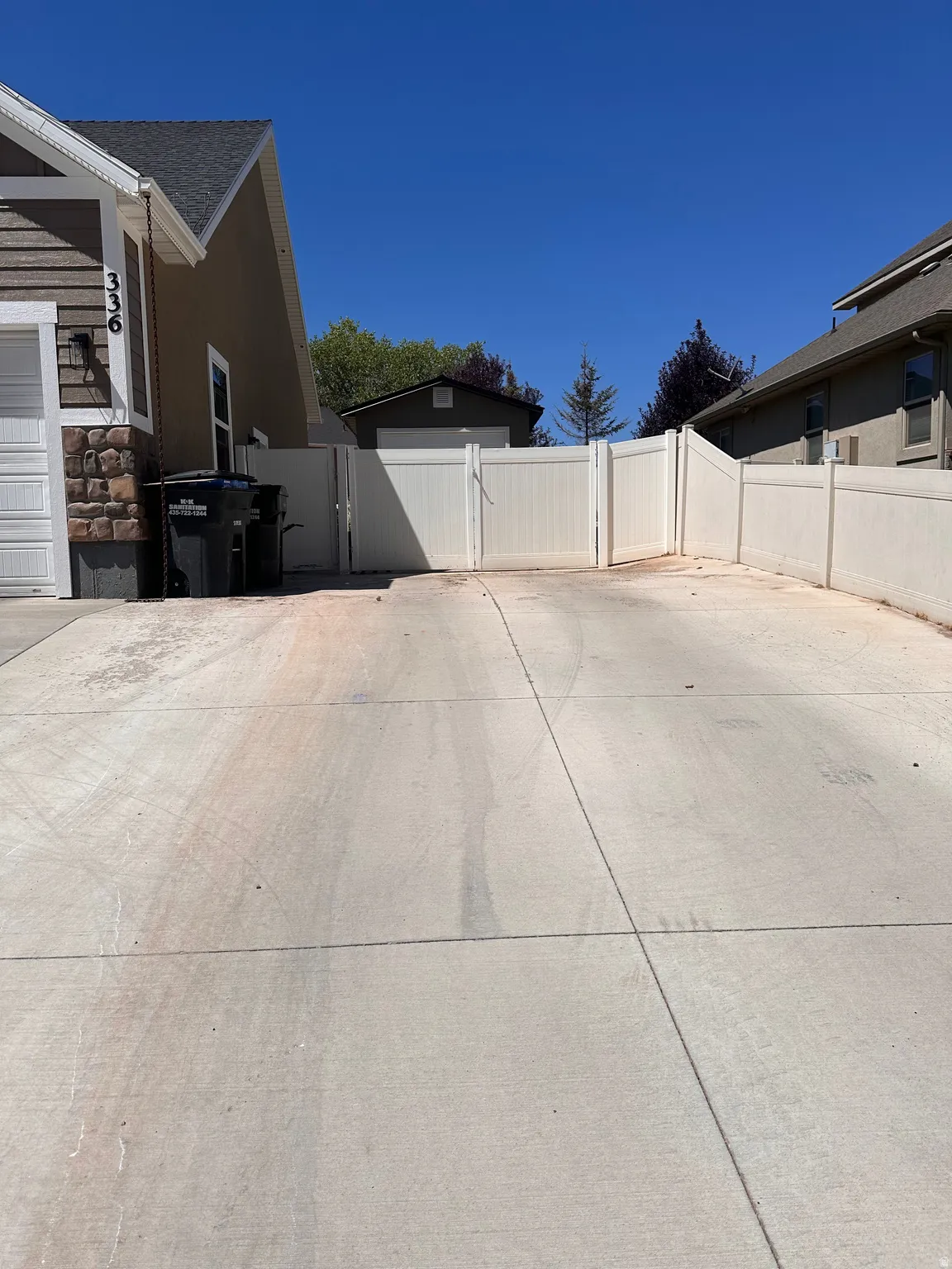 View of home's exterior featuring a gate