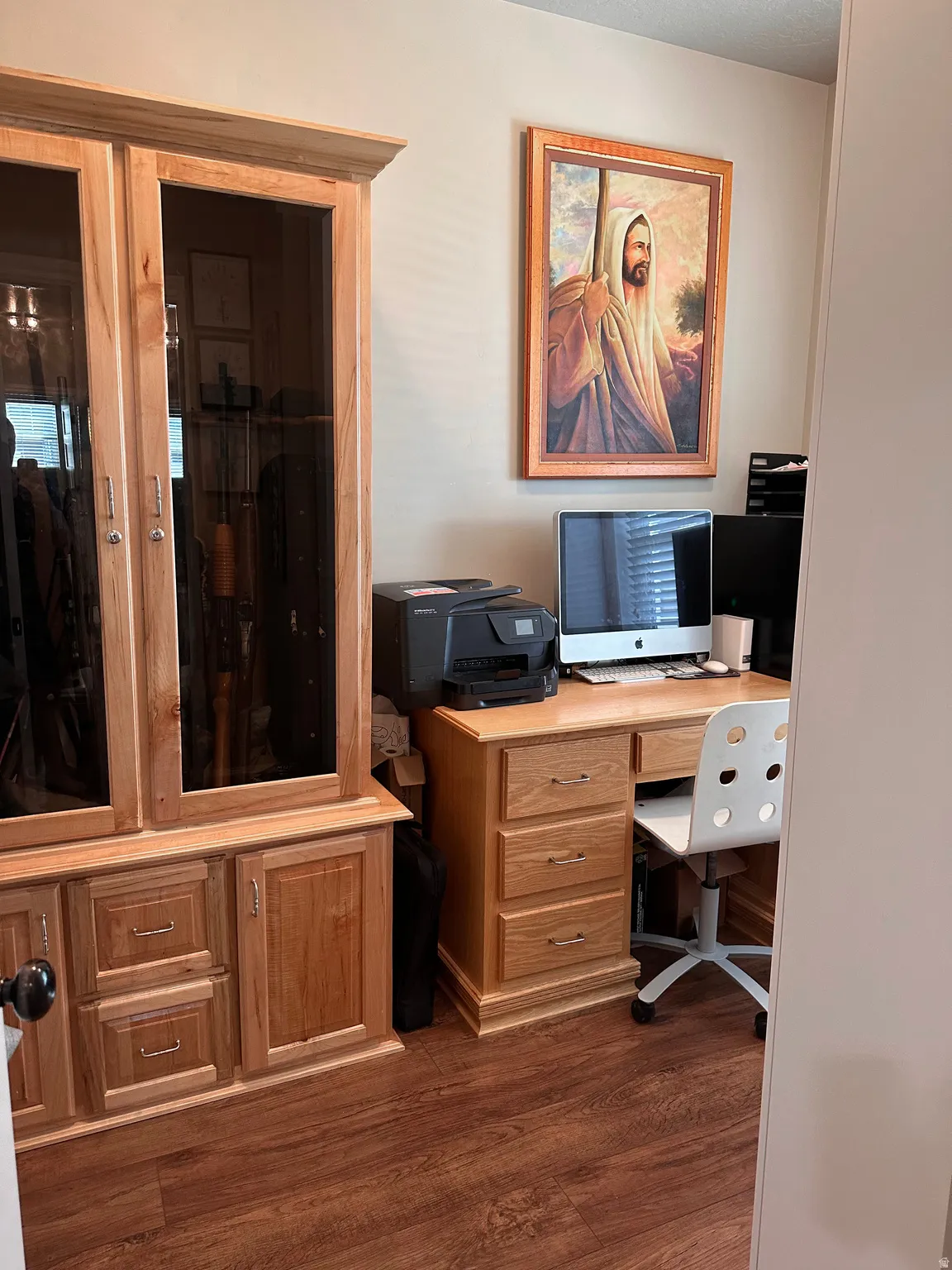 Office area with dark wood-type flooring