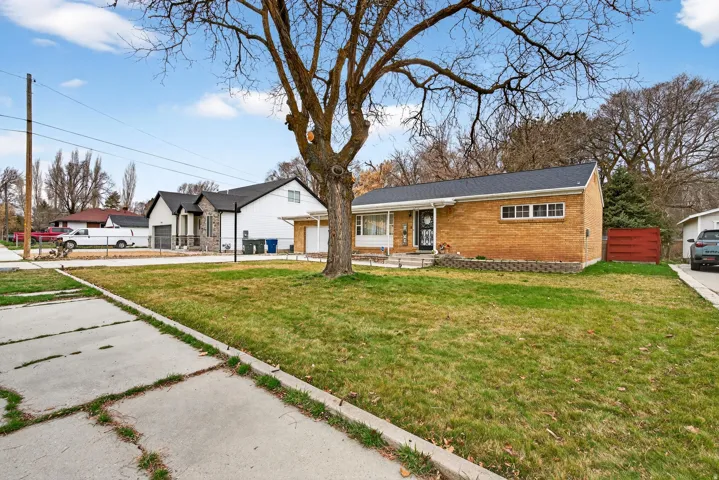 View of front of property featuring brick siding