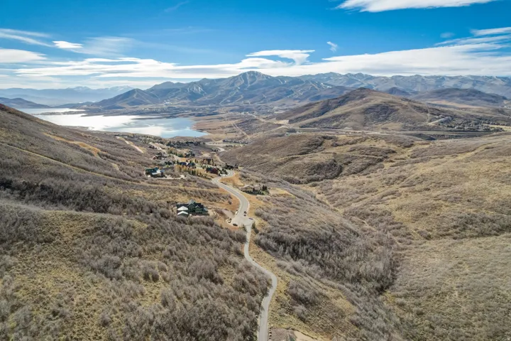 View of mountain background featuring a nearby body of water