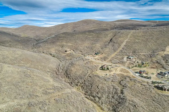 View of mountain background featuring rural landscape