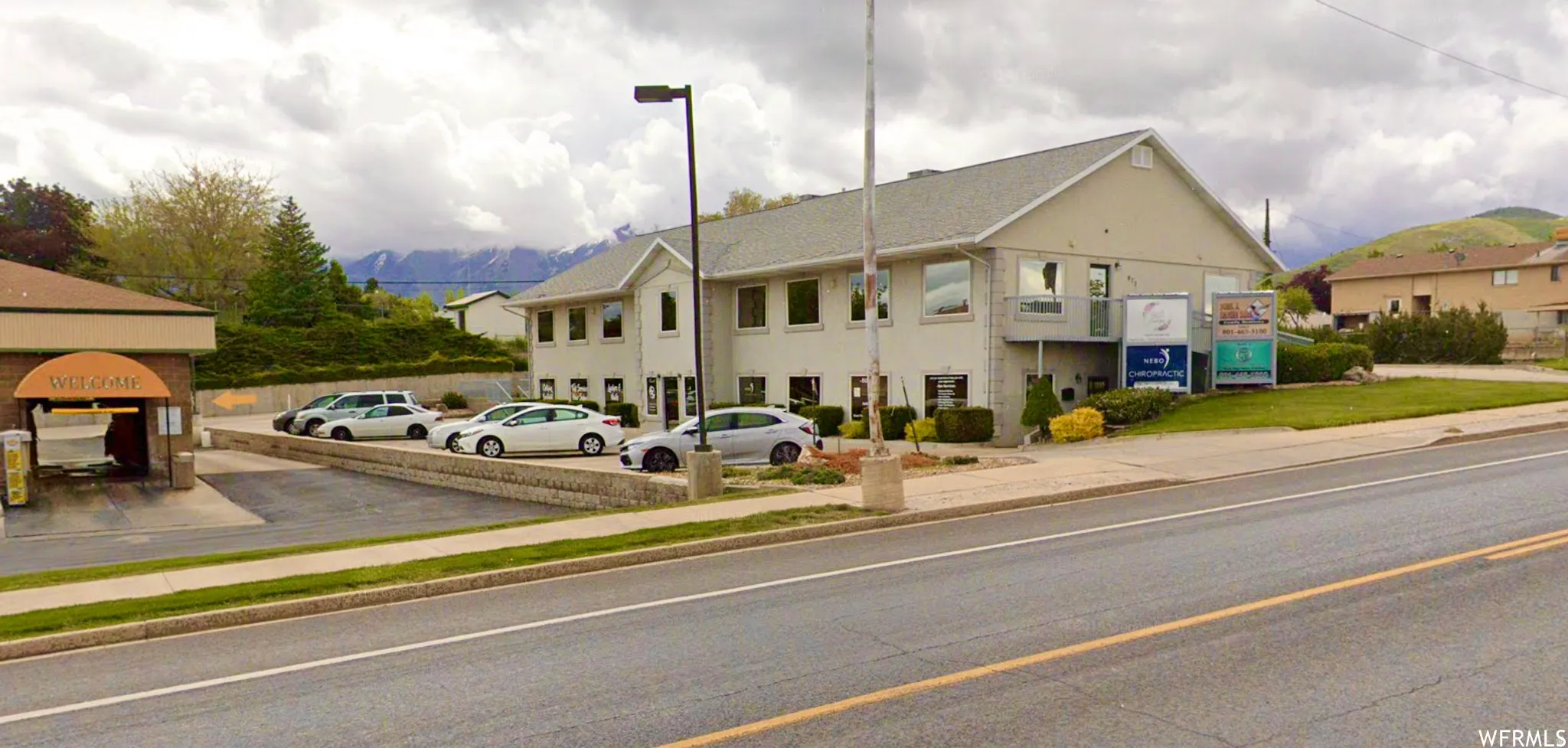 View of front of house with stucco siding