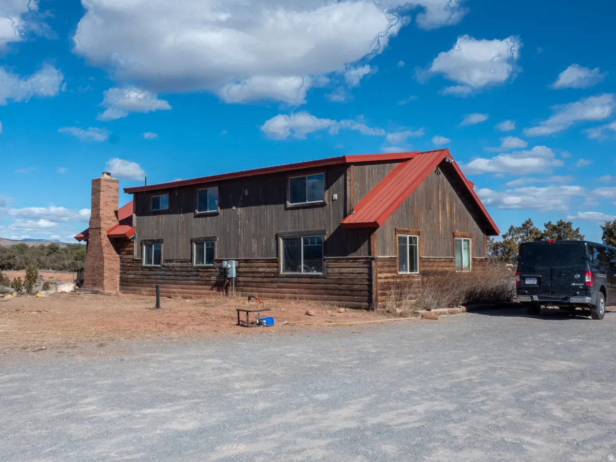 View of front of home with a metal roof