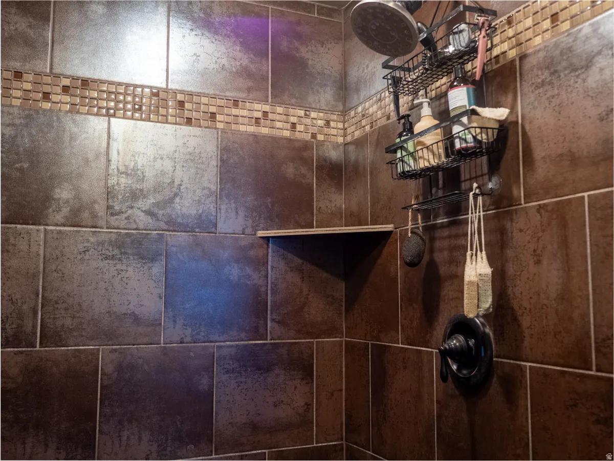 Bathroom view of a tile shower