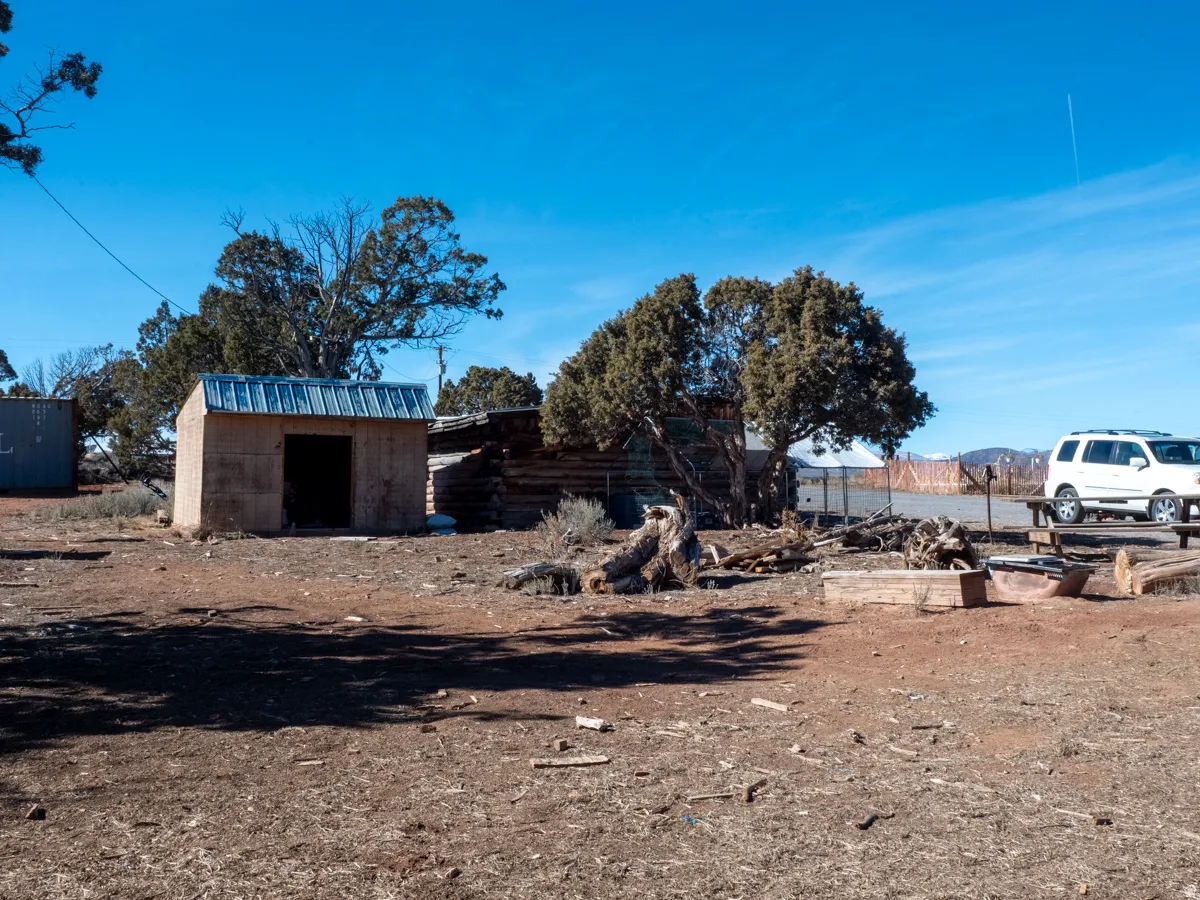 View of yard featuring a storage unit