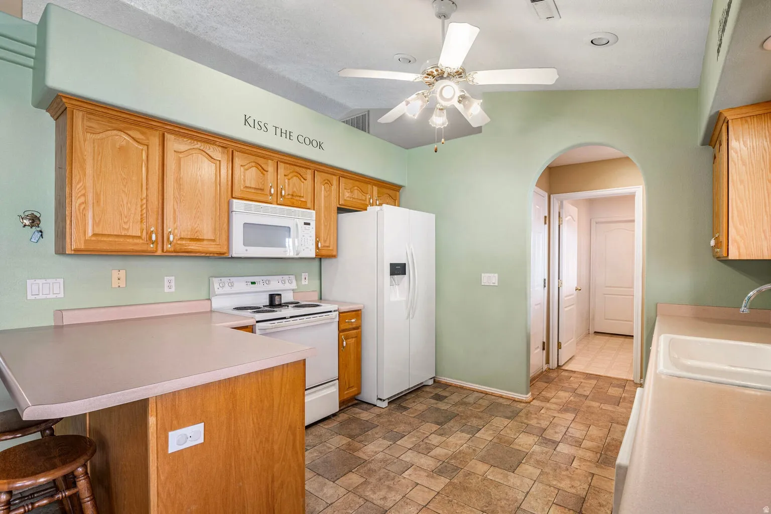 Refrigerator, range, microwave  and dishwasher included.