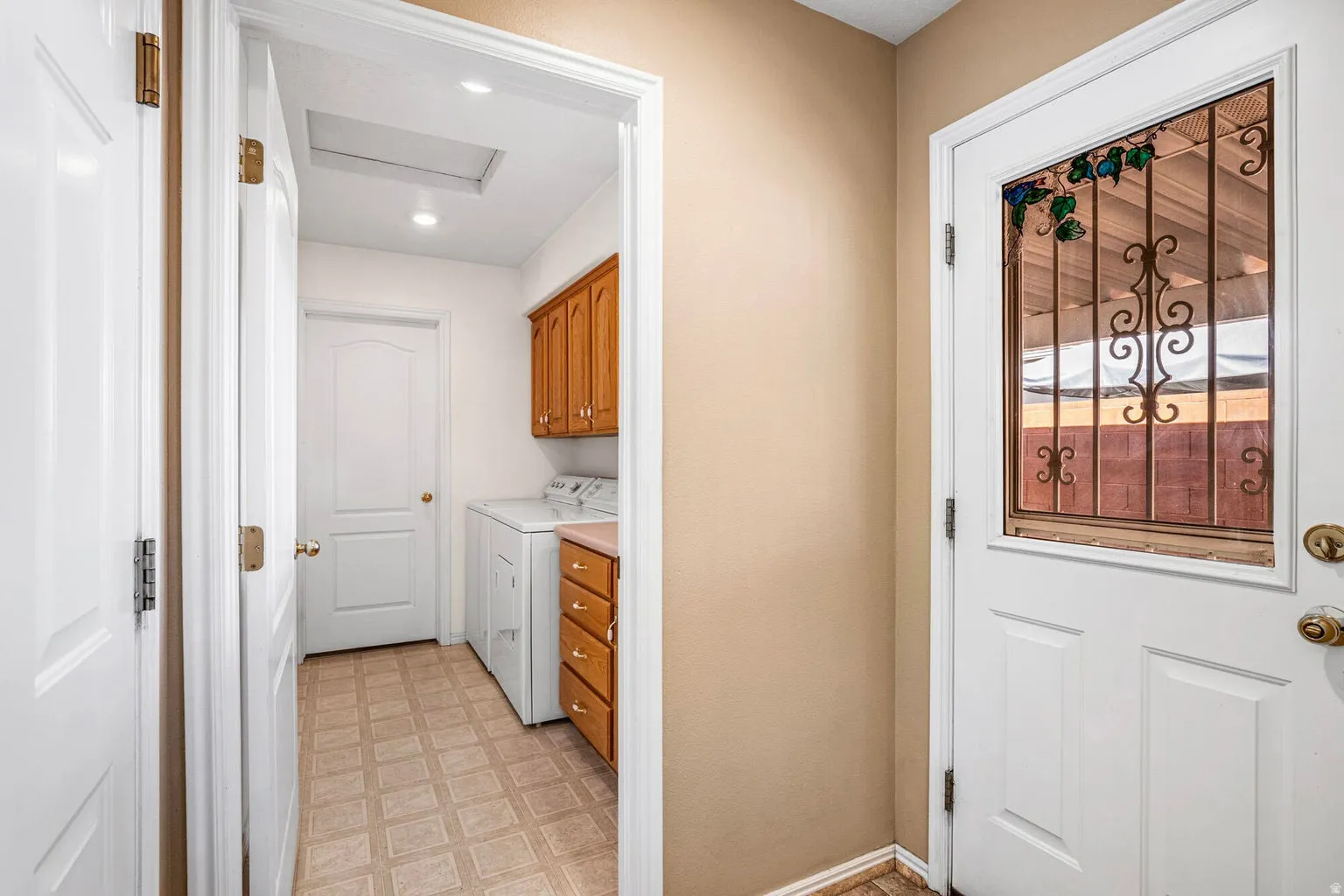 Laundry room and door to backyard