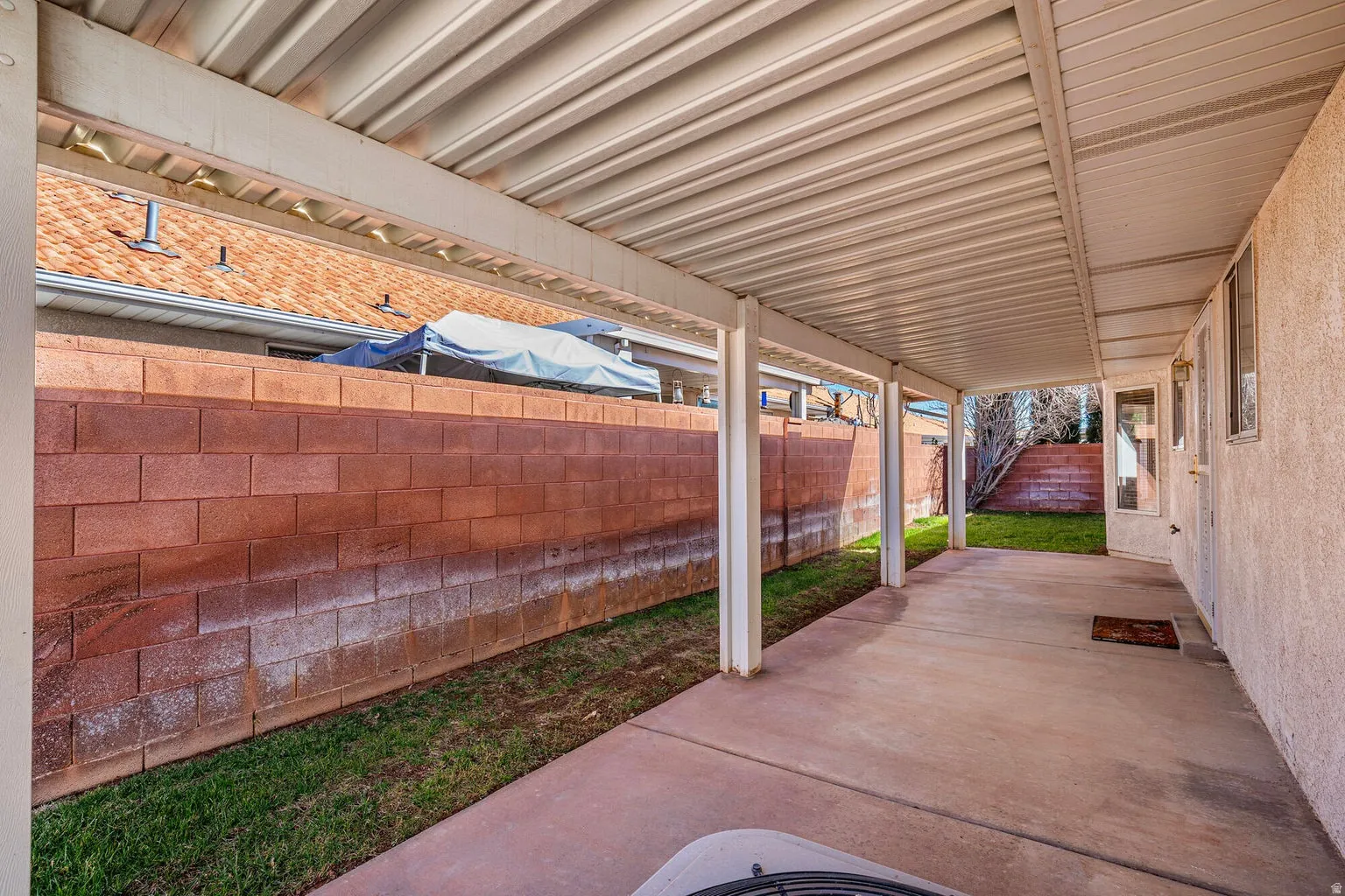 Backyard patio with low maintenance cover