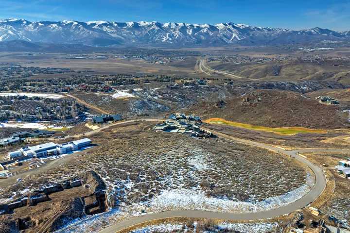 Aerial overview of property's location featuring mountains