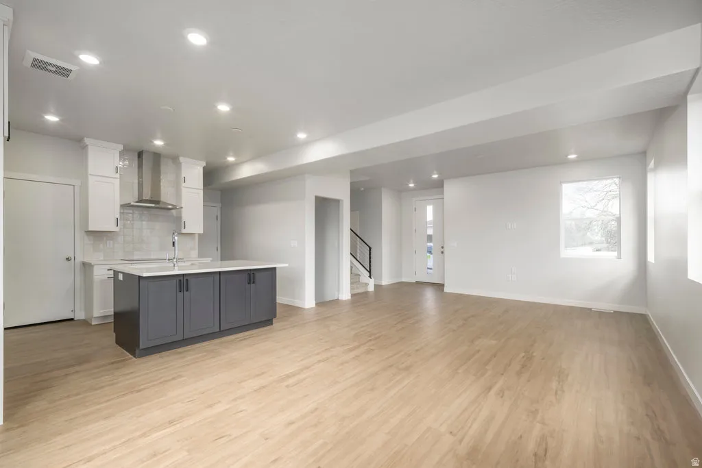 The heart of the home—where morning coffee, quick breakfasts, and long dinners with friends naturally come together. *Spec photo. Colors and finishes will be different.