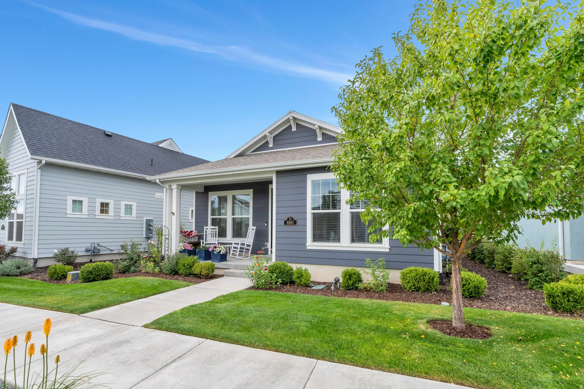 Enjoy the neighborhood from your front porch