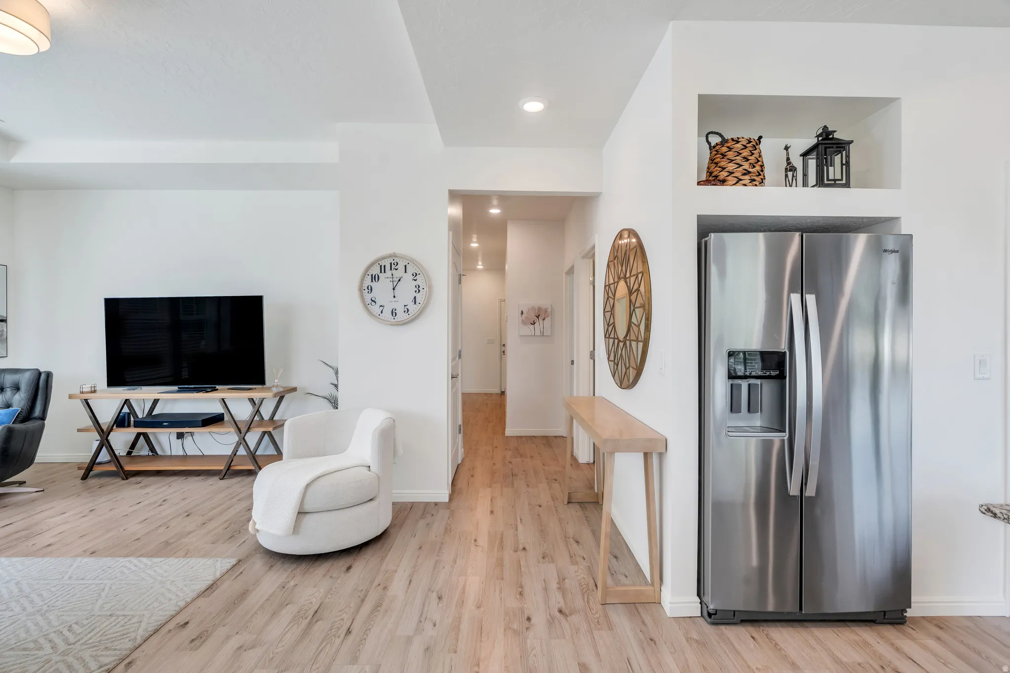 Beautiful faux wood floors make this room bright and inviting