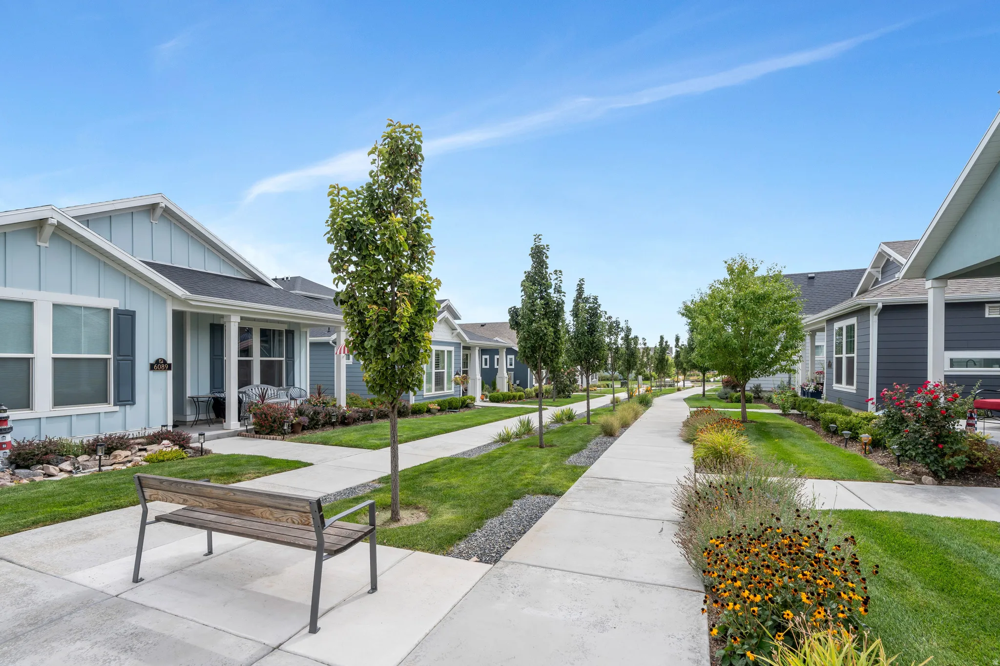 Beautifully manicured paseo is maintained by the HOA