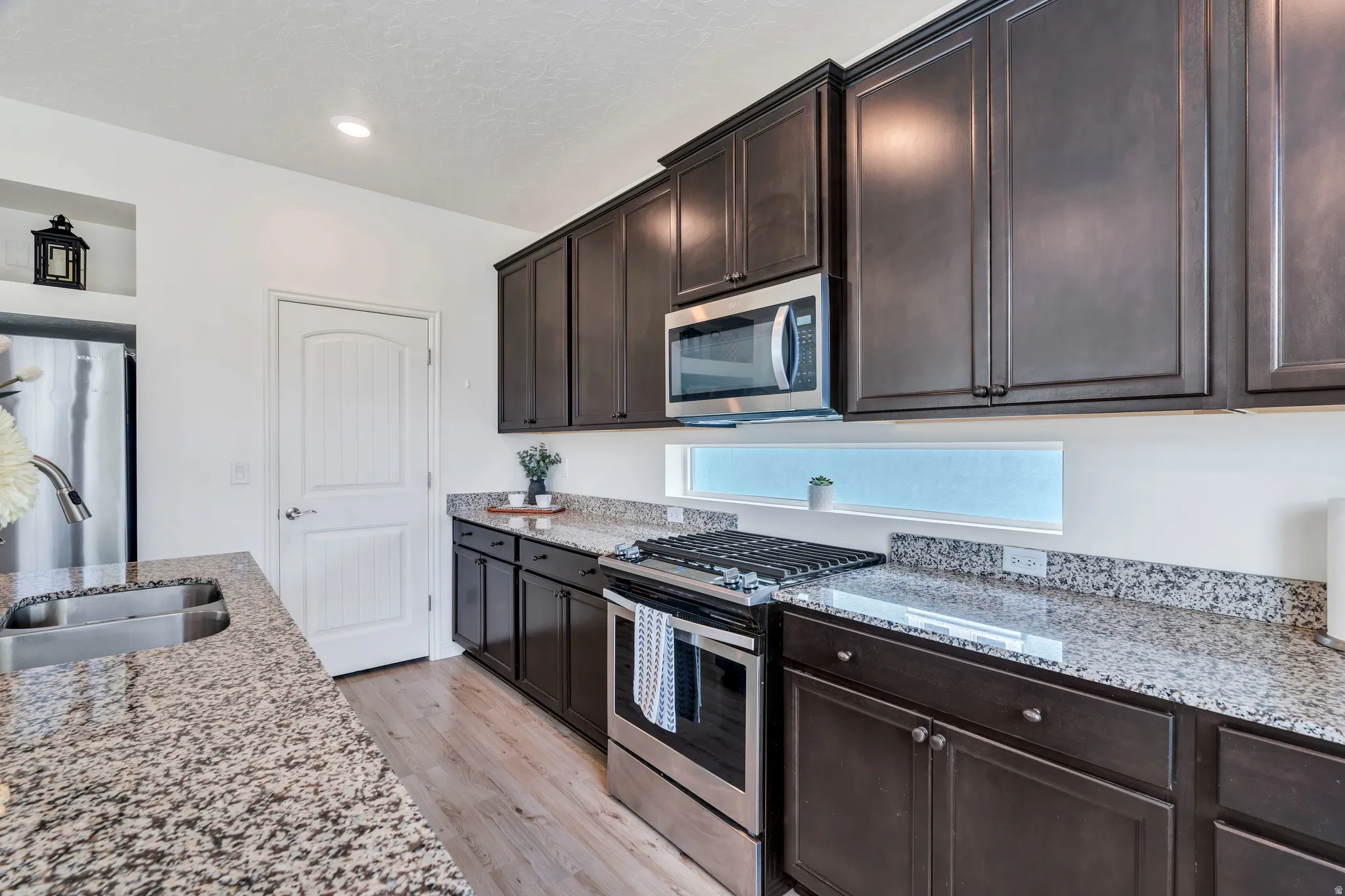 Stainless steel appliances and gas range.