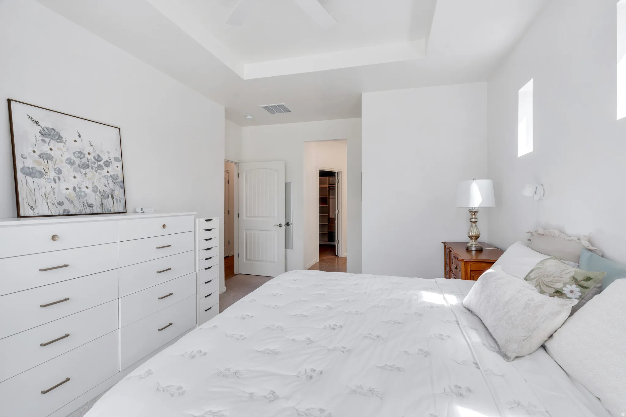 Large primary suite with ensuite bath and walk-in closet