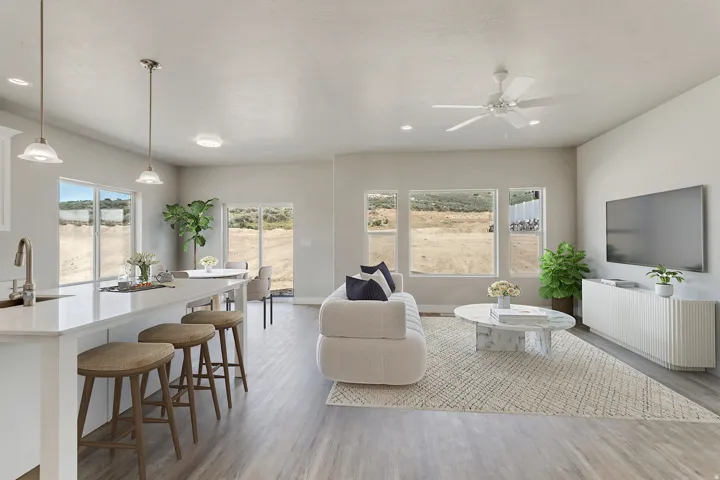 Living room featuring light wood-type flooring, a ceiling fan, and recessed lighting