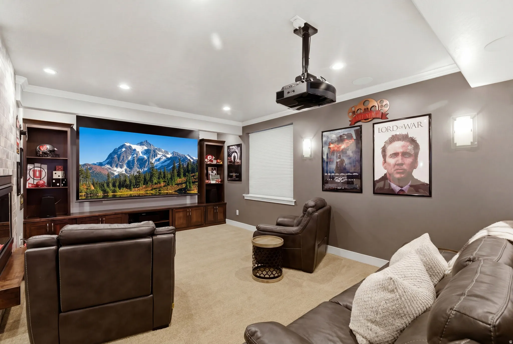 Cinema featuring carpet, ornamental molding, and recessed lighting