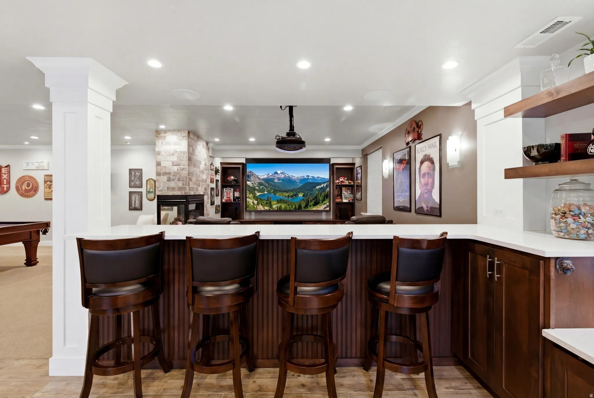 Bar featuring open shelves, recessed lighting, dark wood finish cabinets, light stone counters, and pool table