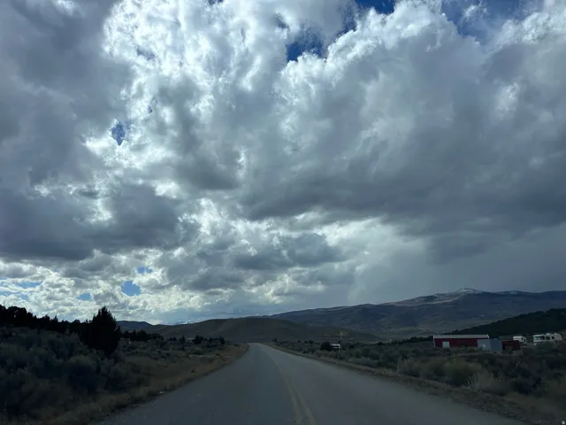 View of asphalt road featuring a mountain view