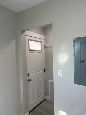 Rear entry and light laminate flooring