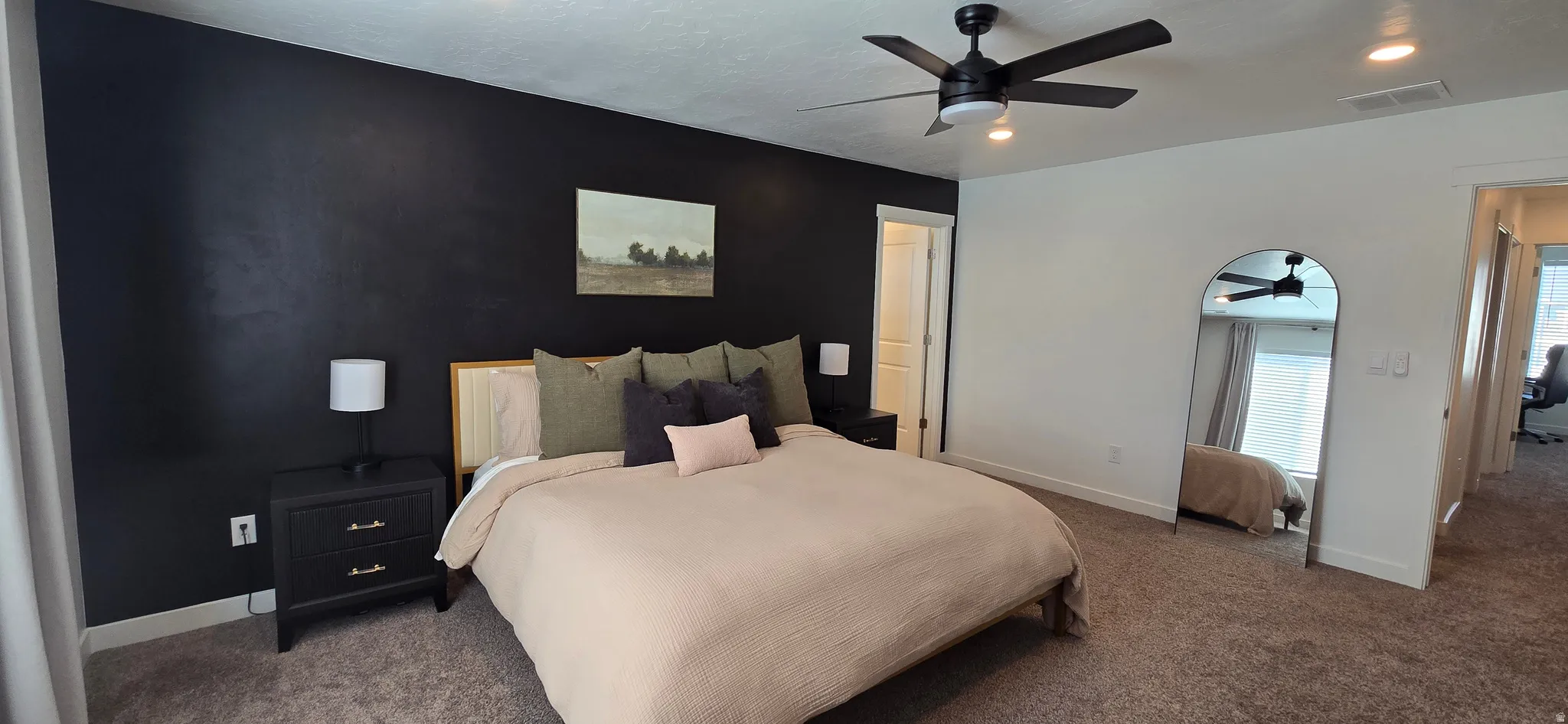 Bedroom featuring dark carpet, a ceiling fan, and recessed lighting