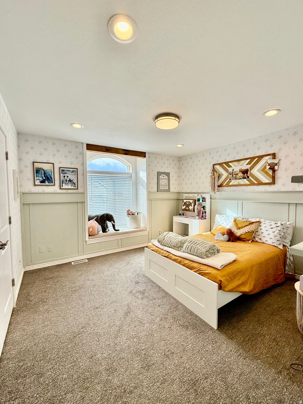 Bedroom 3 featuring upgraded carpet, recessed lighting, updated closet doors, and a bay box window.