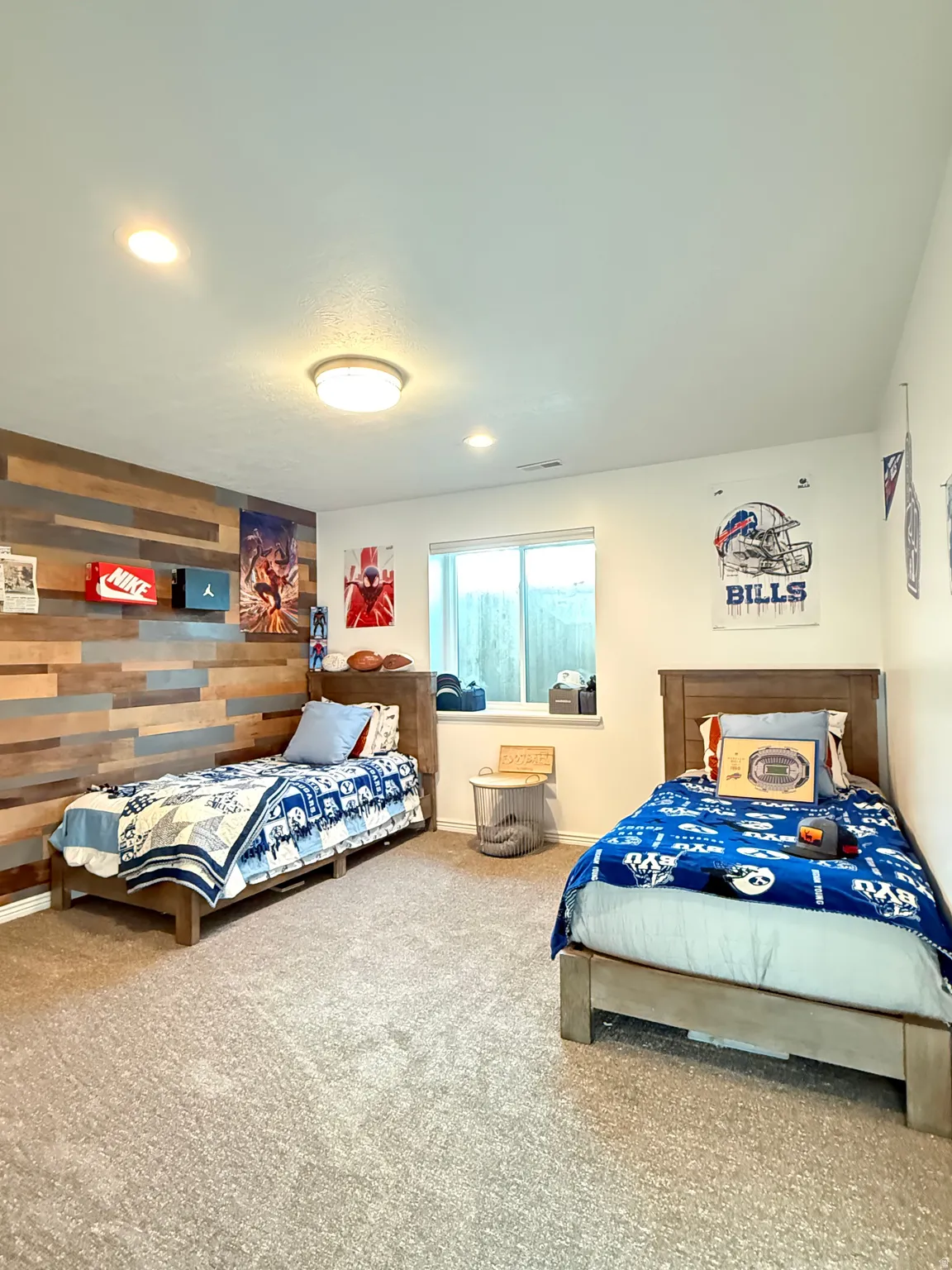 Bedroom 5 with updated carpet, closet doors, paint, and windows.