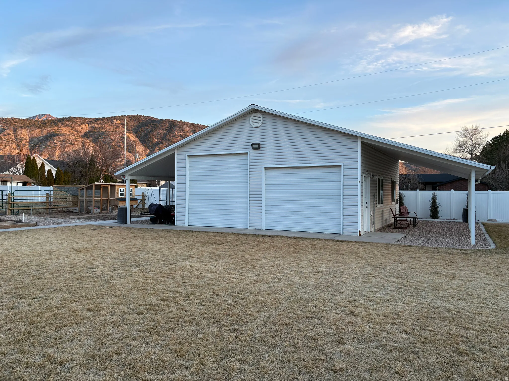 Large detached shop for additional parking, storage, or workout/game area. New shelves for storage, a new electrical sub-panel, epoxy floor, and upgraded insulation. Landscaping is new and very green in the summer with a new sprinkler system. New Roof.