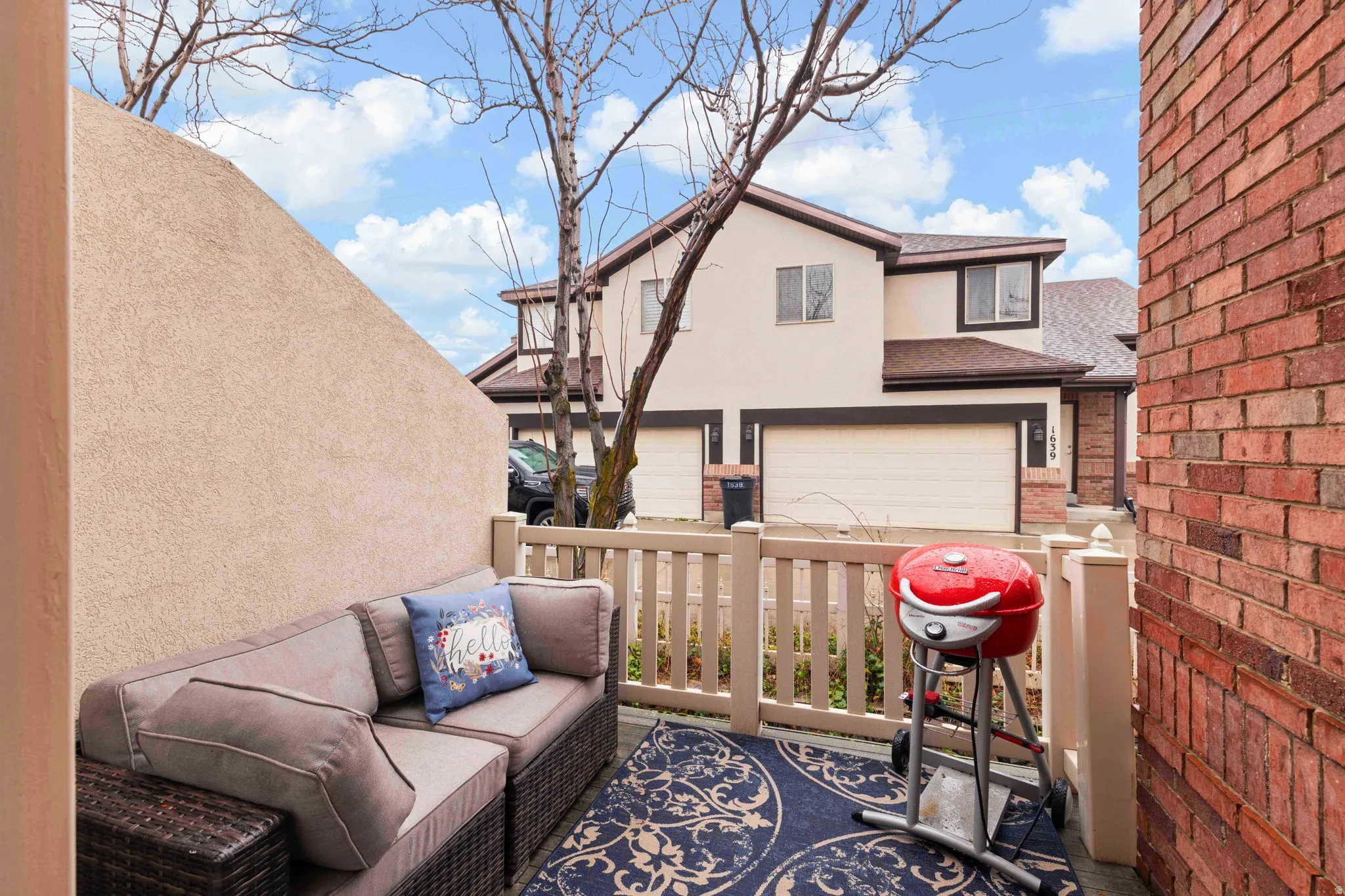 Private outdoor space with low-maintenance living—no yard work required