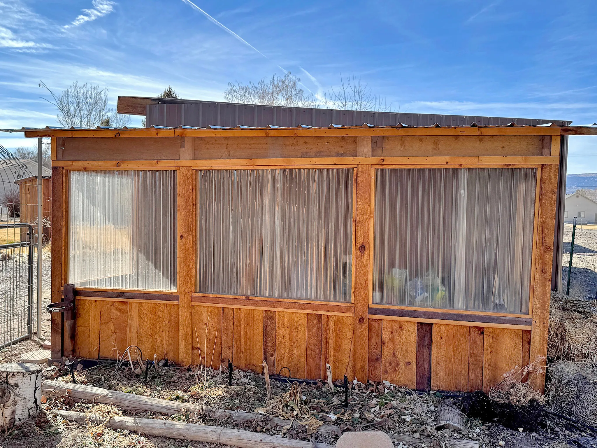 Gate with an outbuilding