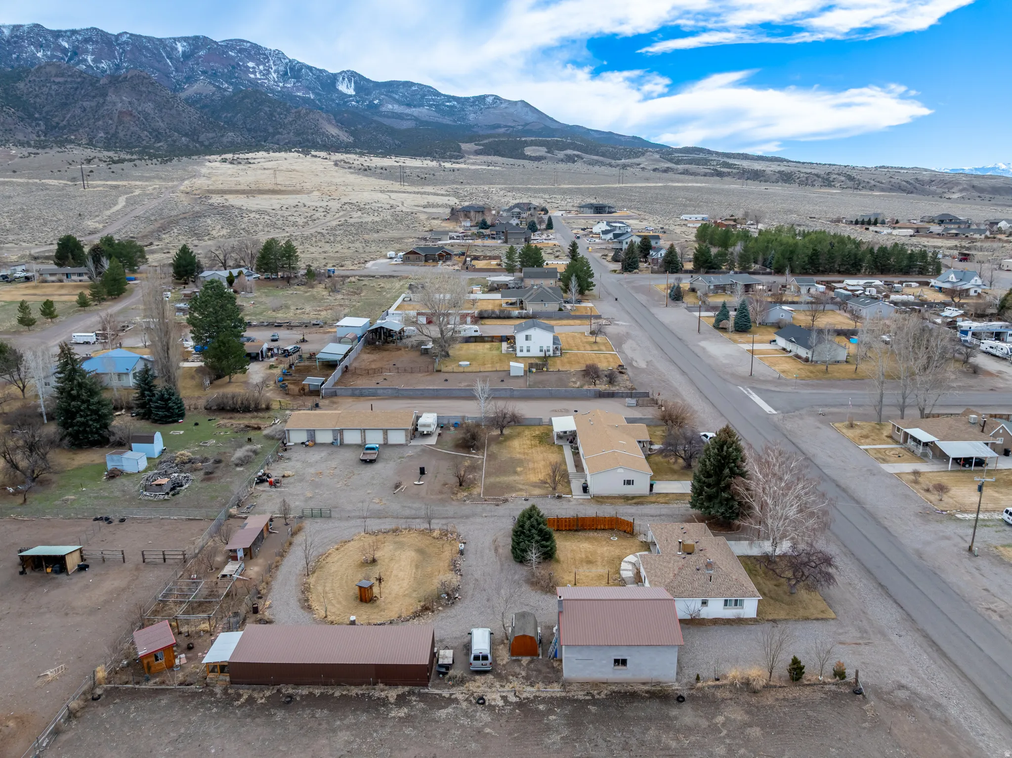 Aerial view of residential area with a mountain backdrop