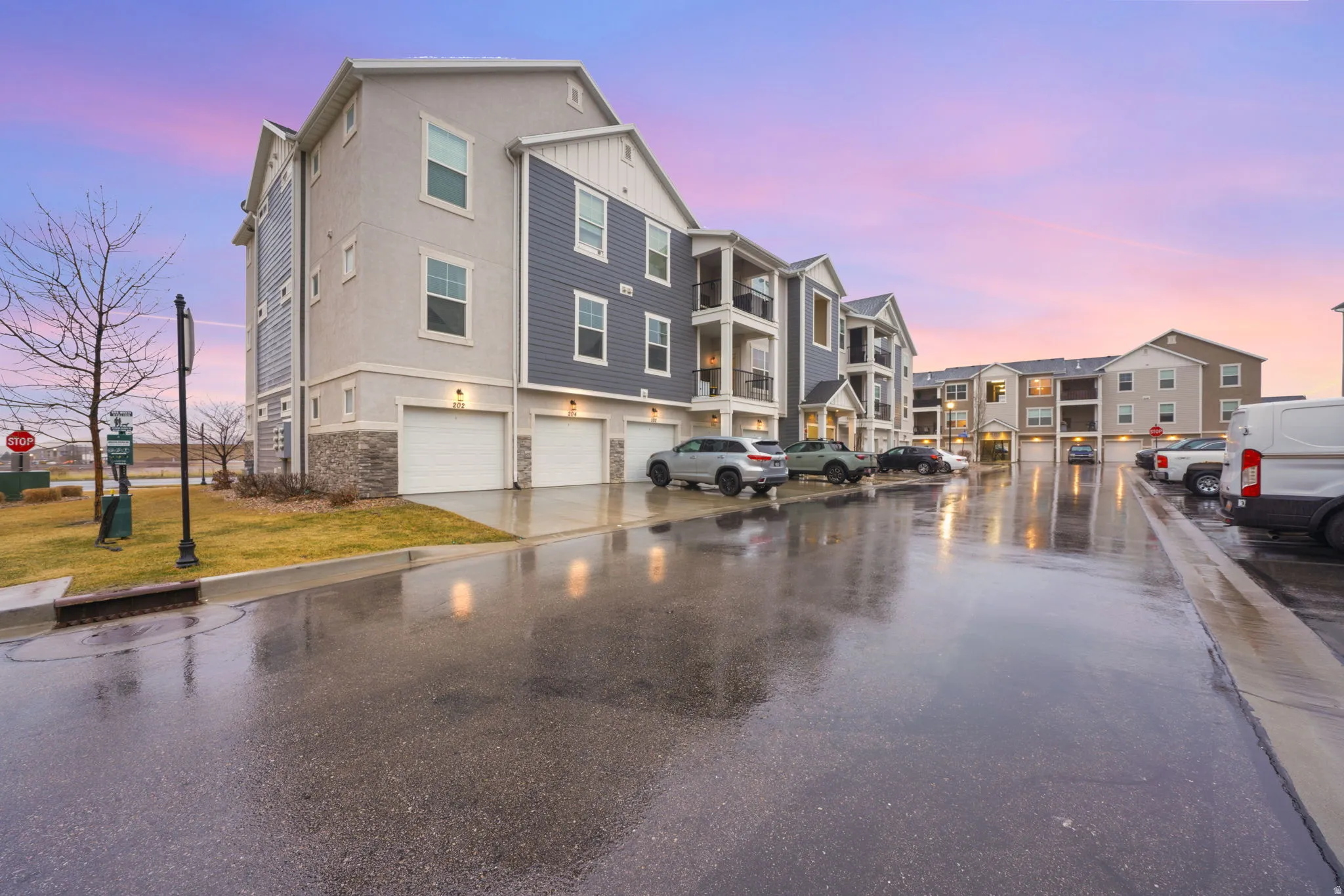 View of asphalt street with curbs and a residential view