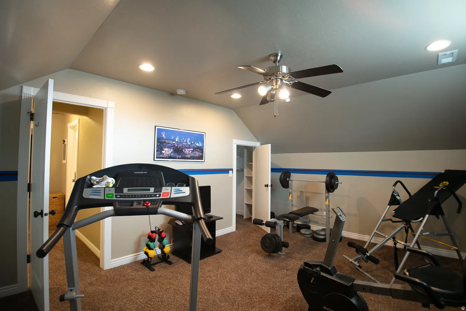 Large upstairs bonus room currently being used as an exercise room with recessed lighting, ceiling fan and closet. Can be used as a bedroom.
