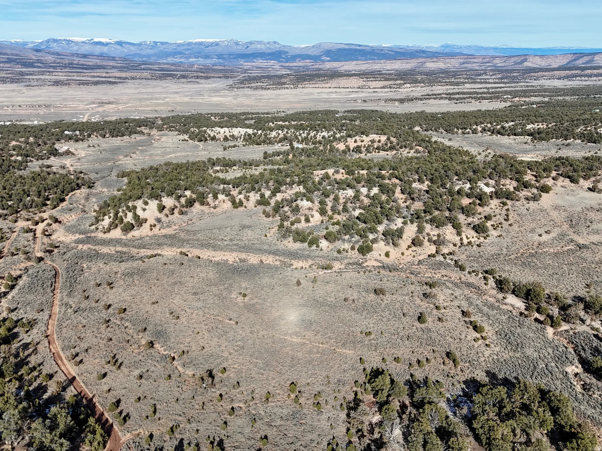 Aerial overview of property's location with mountains