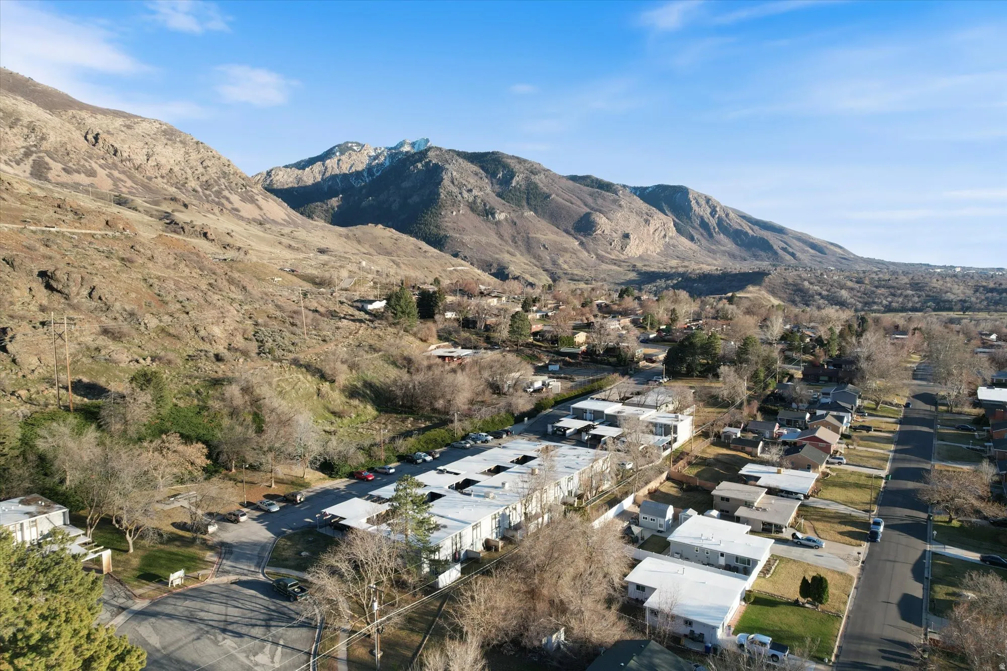 Mountain view featuring nearby suburban area