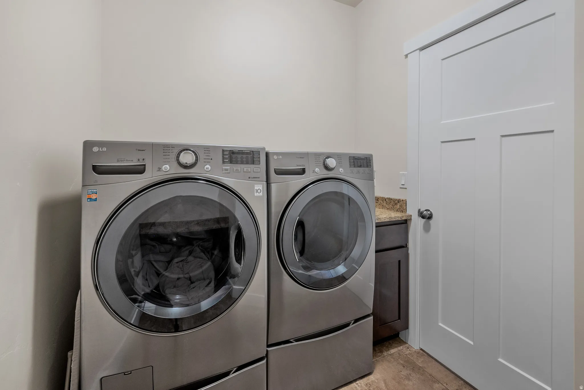 Laundry area featuring washer and clothes dryer
