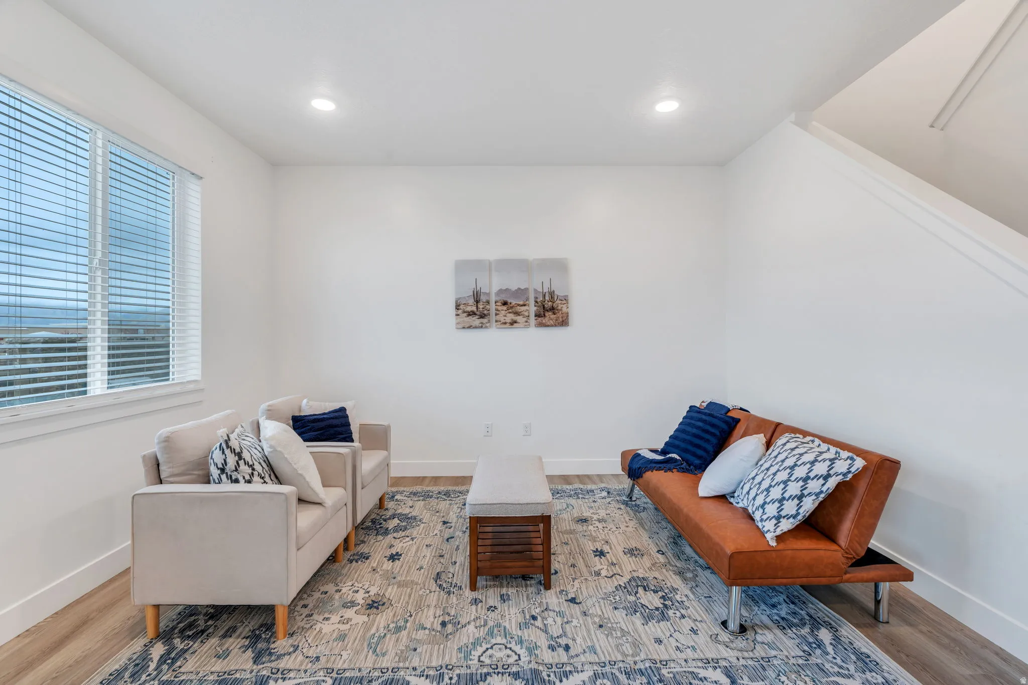 Sitting room featuring wood finished floors and recessed lighting