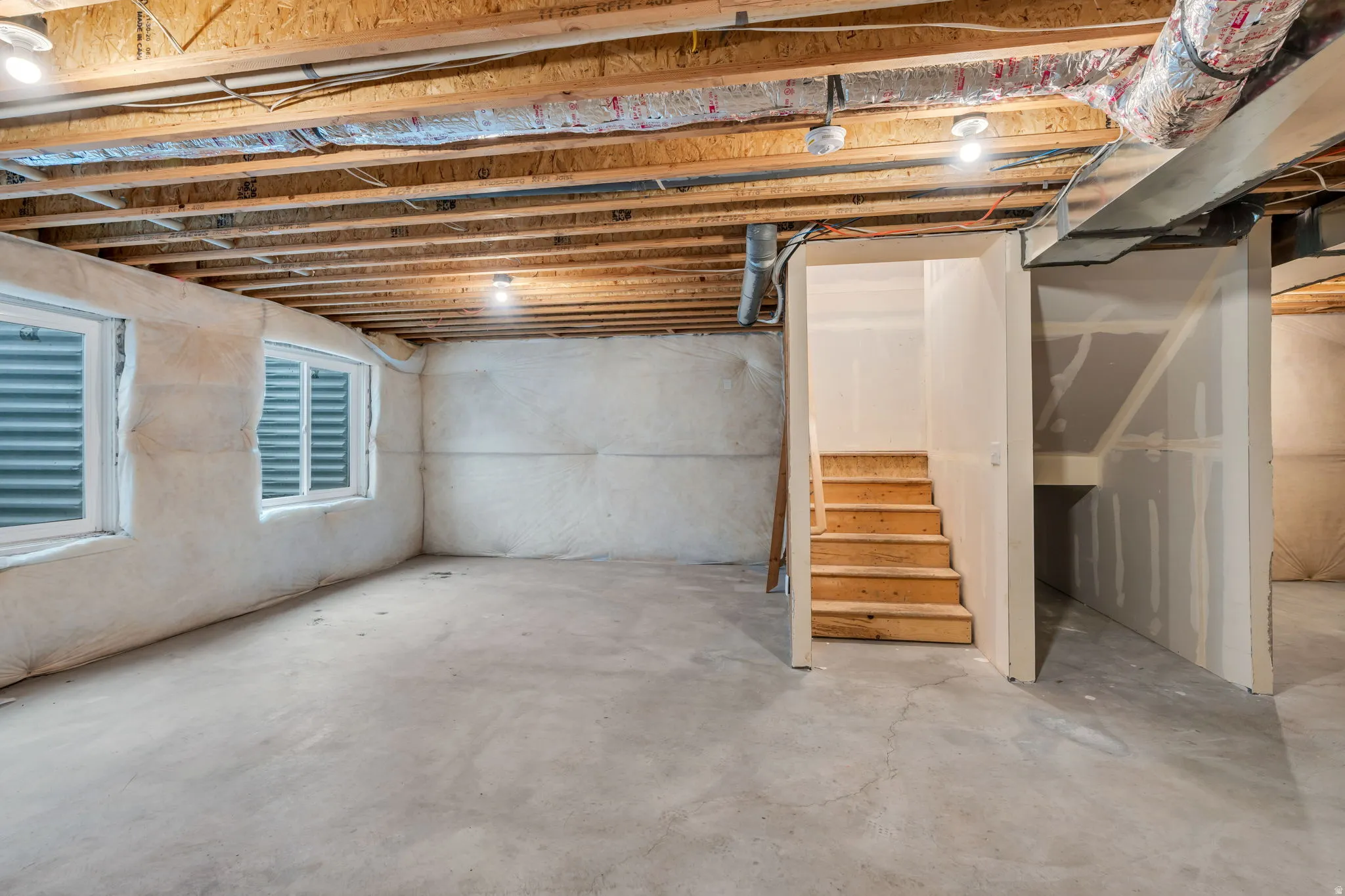 Below grade area featuring stairs