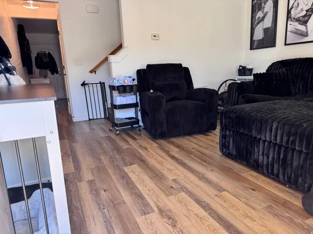 Living room featuring hardwood / wood-style floors