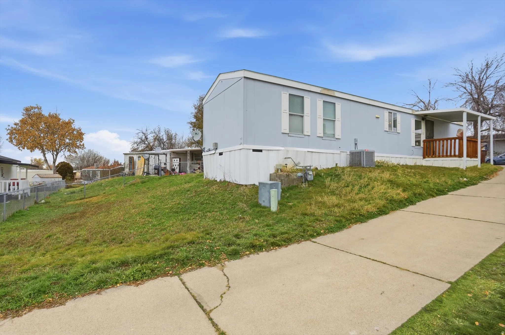 View of home's exterior featuring a cooling unit