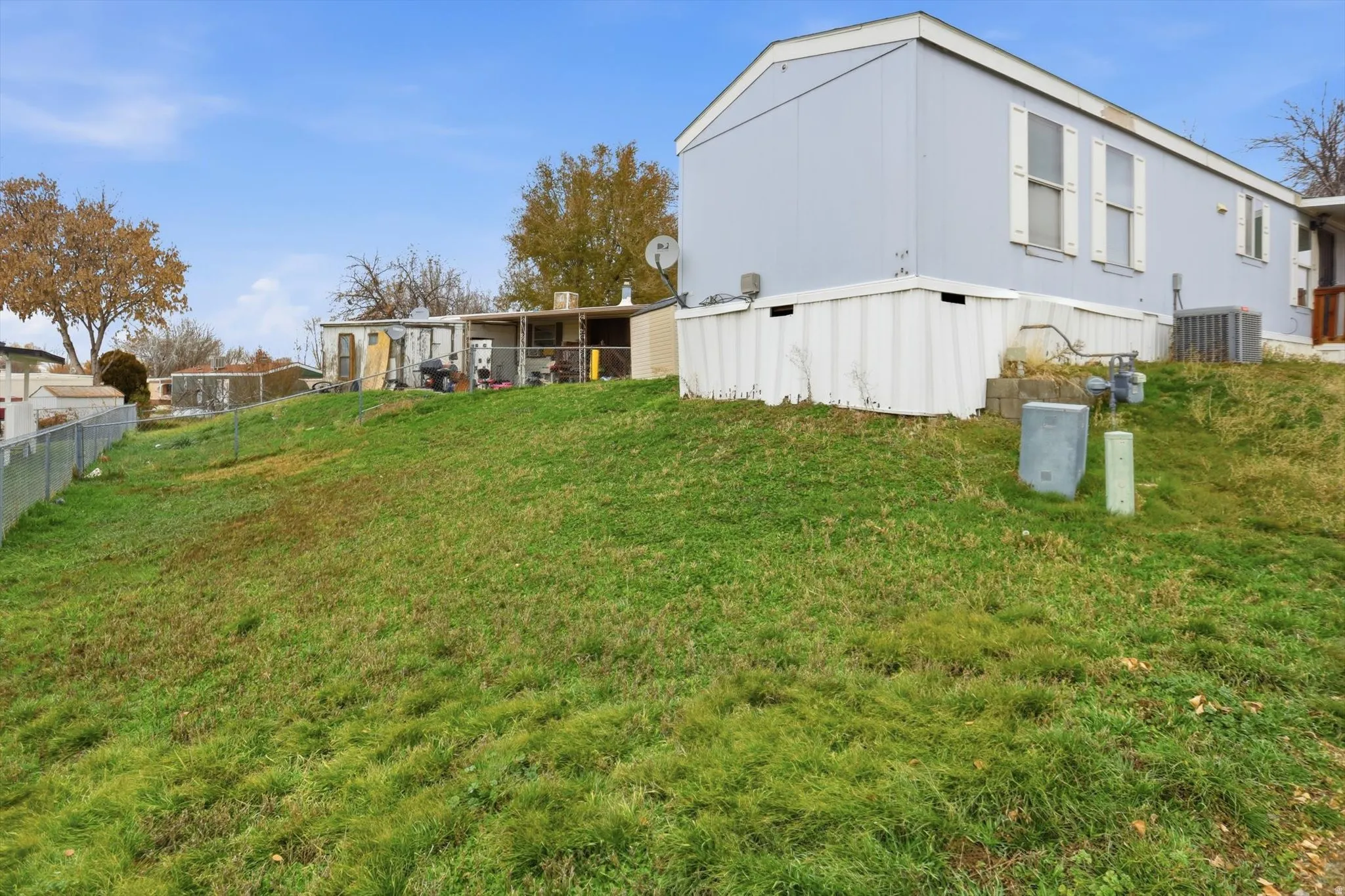 View of property exterior featuring a central air condition unit