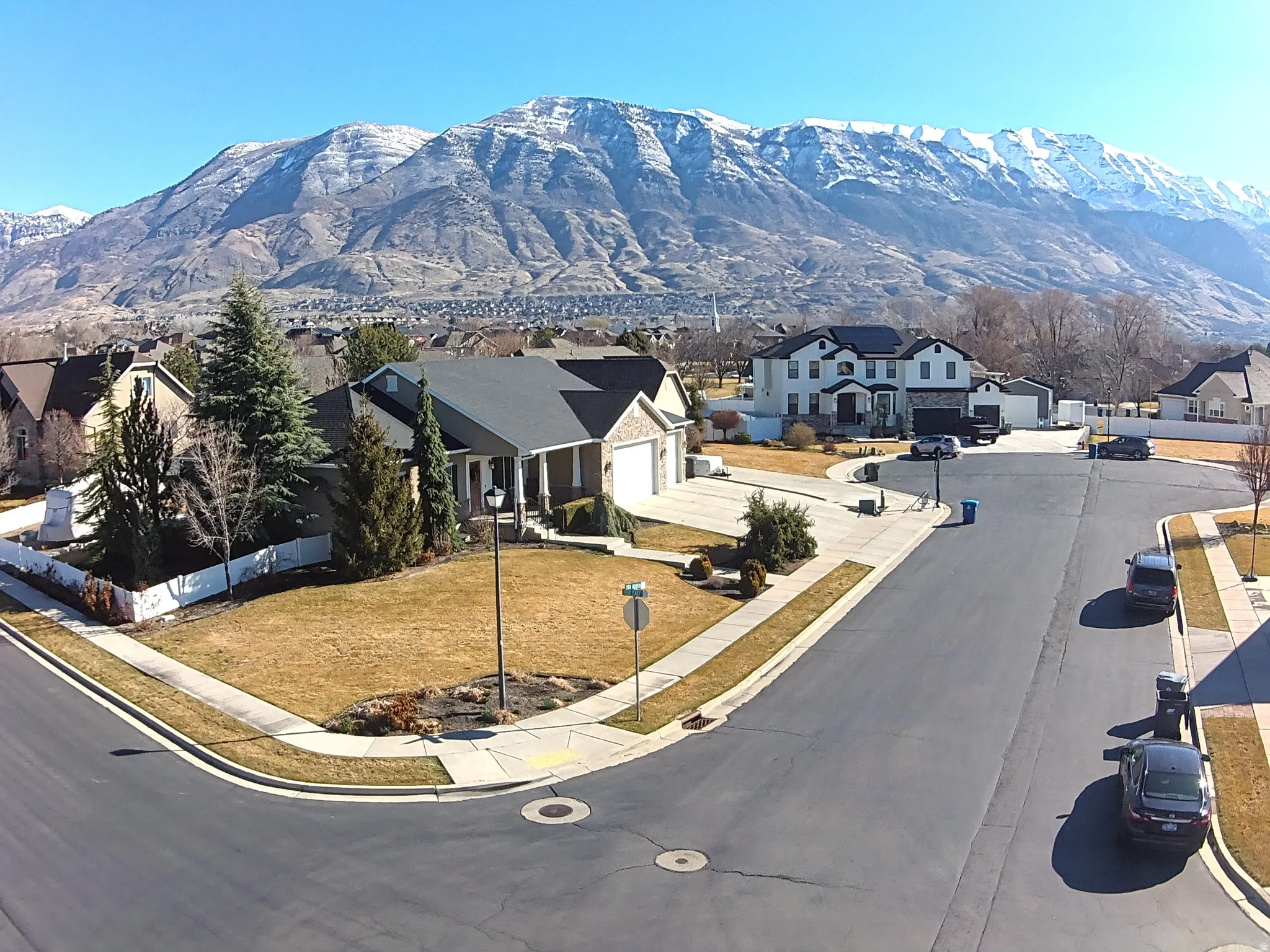 View of mountain backdrop with nearby suburban area